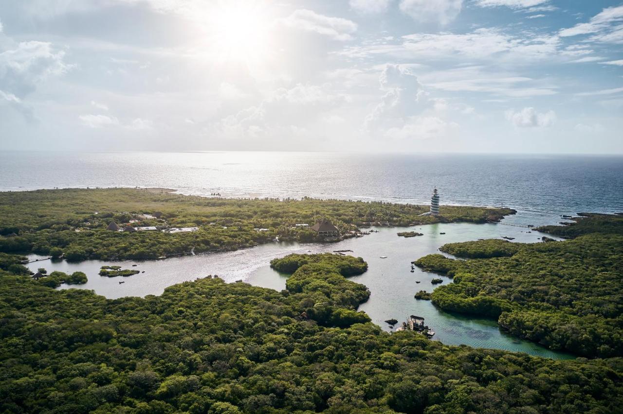 Hotel Xcaret Arte - All Parks All Fun Inclusive - Adults Only Xcaret Park Esterno foto Aerial view of the bay