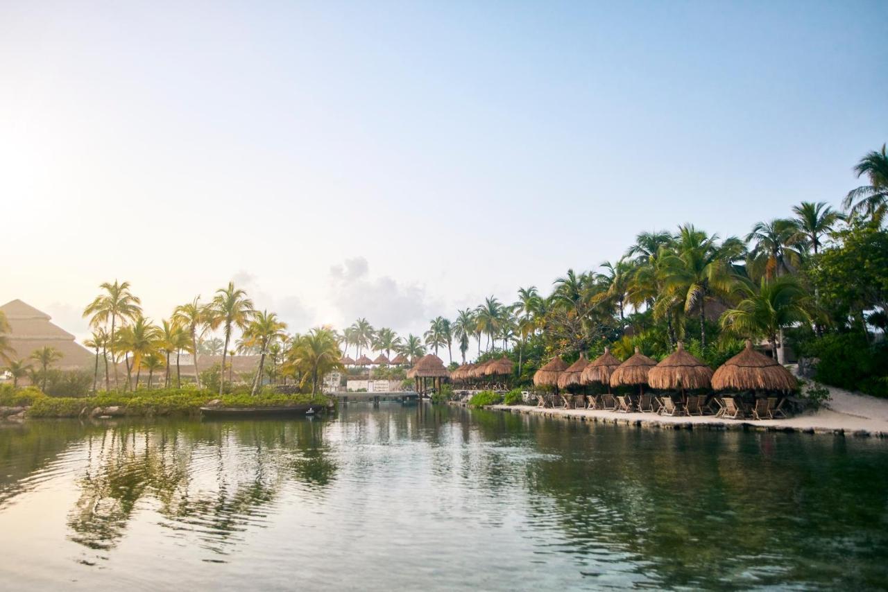 Hotel Xcaret Arte - All Parks All Fun Inclusive - Adults Only Xcaret Park Esterno foto The lagoon at the resort